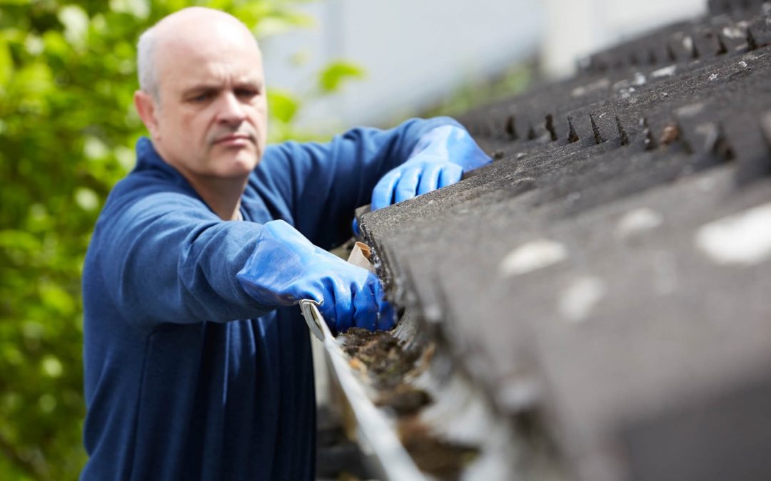 winterize your home by cleaning the gutters